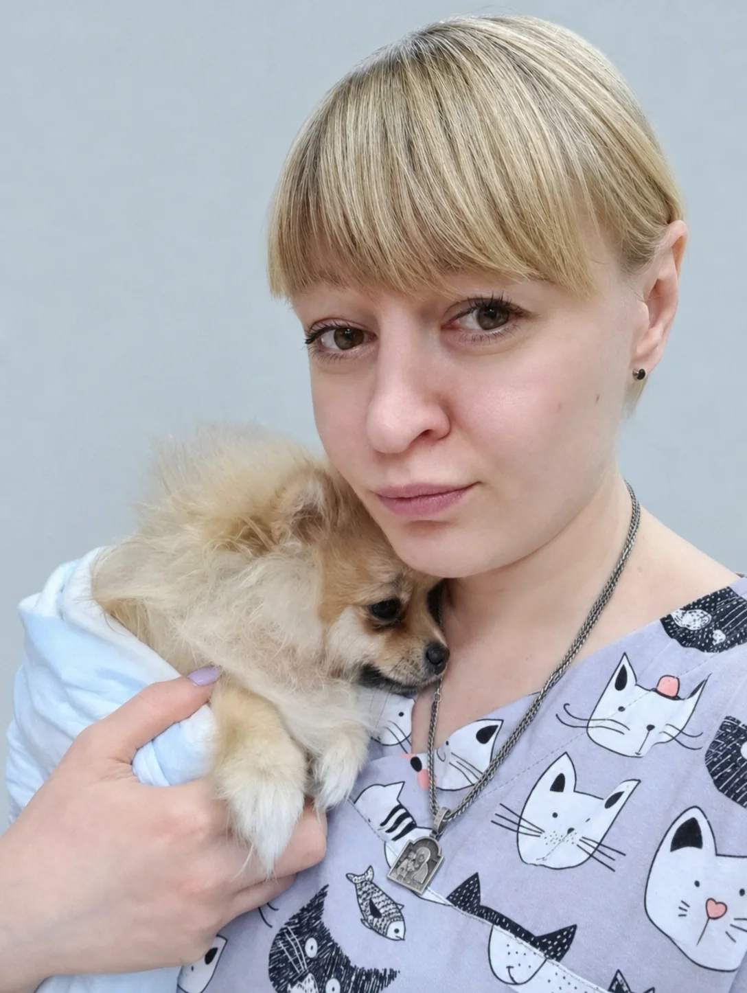 Наталья с собакой на руках